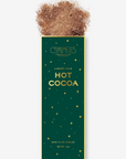 Emerald green box with gold accents on the front. Box reads "Luxury Hot Cocoa" with Compartes logo near the top in the center. Hot cocoa powder displayed on top of the box