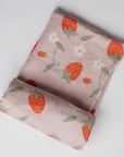 Strawberry Fields Swaddle on white background.