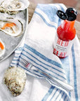 Original Hot Sauce next to oysters on ice