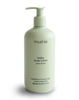 Mushie baby lotion on white background