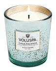 Casa Pacifica Classic Candle lit on white background.