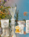 Wildflower Candle collection with floral background