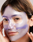 girl with brown hair with purple gel mask on