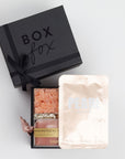 BOXFOX Bridesmaid Gift Box in Matte Black with Lapcos Pearl Brightening Mask, Sugarfina sparkling pink gummies, Pinch Provisions pinch velvet bridesmaids essential kit