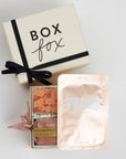 BOXFOX Bridesmaid Gift Box in Creme box with Lapcos Pearl Brightening Mask, Sugarfina sparkling pink gummies, Pinch Provisions pinch velvet bridesmaids essential kit