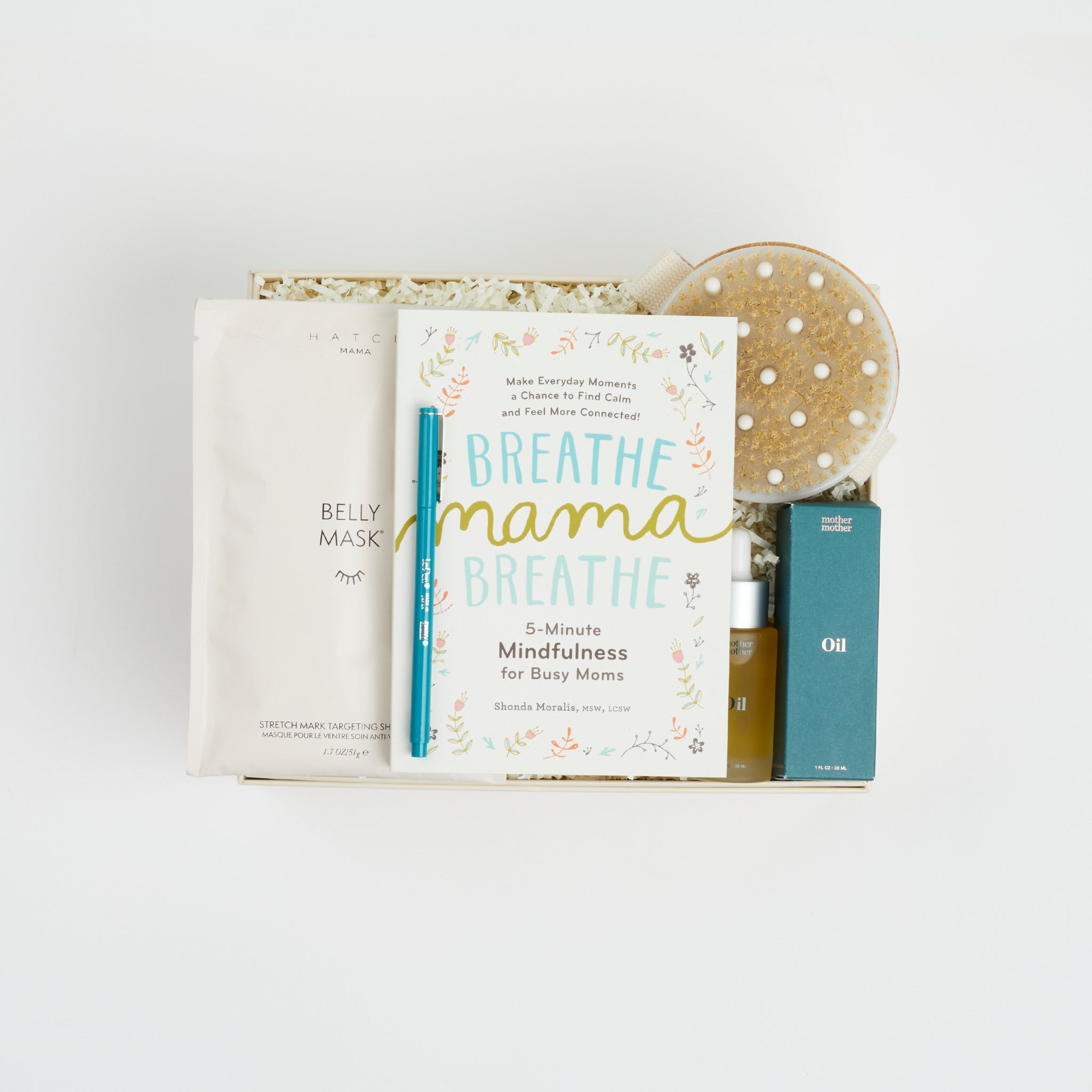 BOXFOX Creme Gift Box filled with "Breathe Mama Breathe" Book, Le Pen Teal Pen, Mother Mother Belly Oil, HATCH Belly Sheet Mask , and BOXFOX Round Dry Brush
