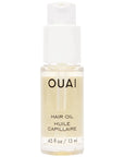Small clear vile of hair oil with white pump
