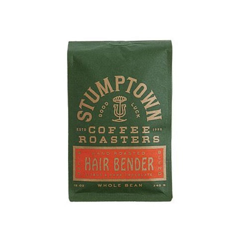 Dark green coffee bag with gold text. On the bottom third of the bag is a red colored box that gold text that reads &quot;Hair Bender&quot;