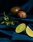 Skinny Spicy Margarita Sachet ingredients on blue fabric