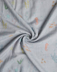 Under the Sea Swaddle in a swirl.