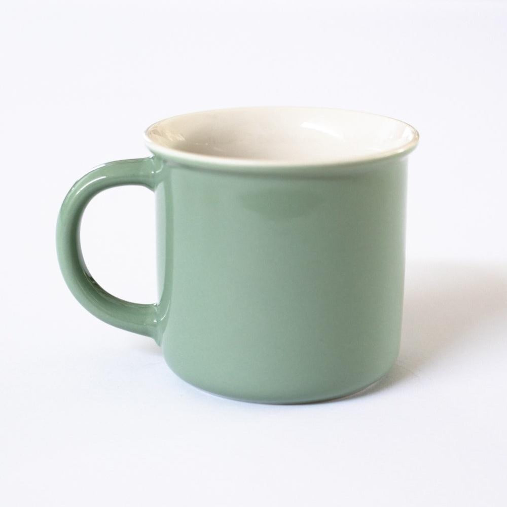 sage colored ceramic mug with white interior