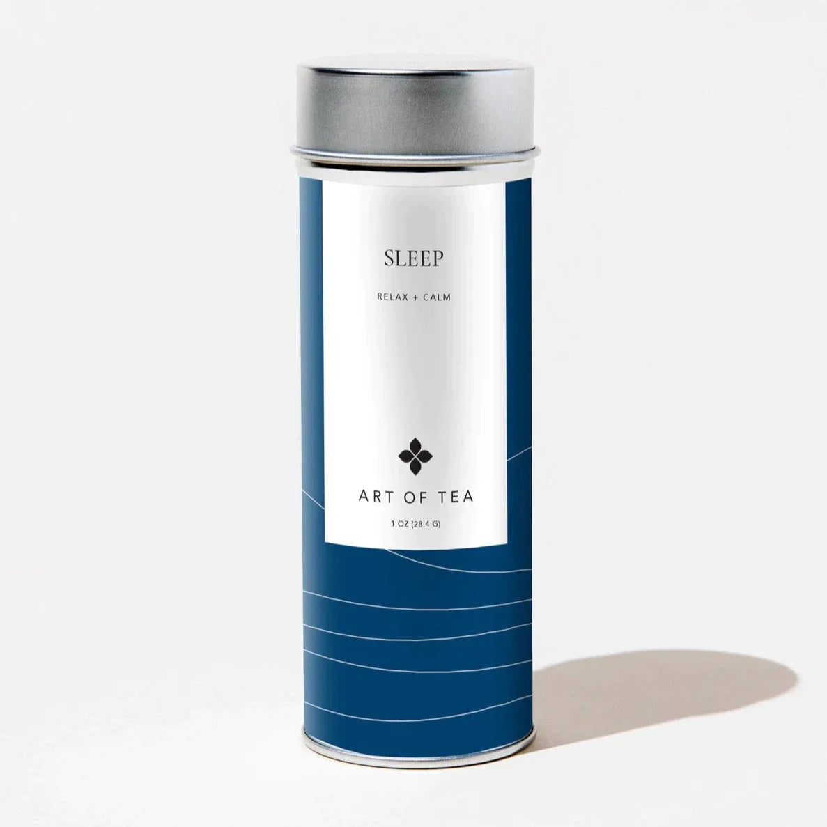 blue sleep tea tin with white accents