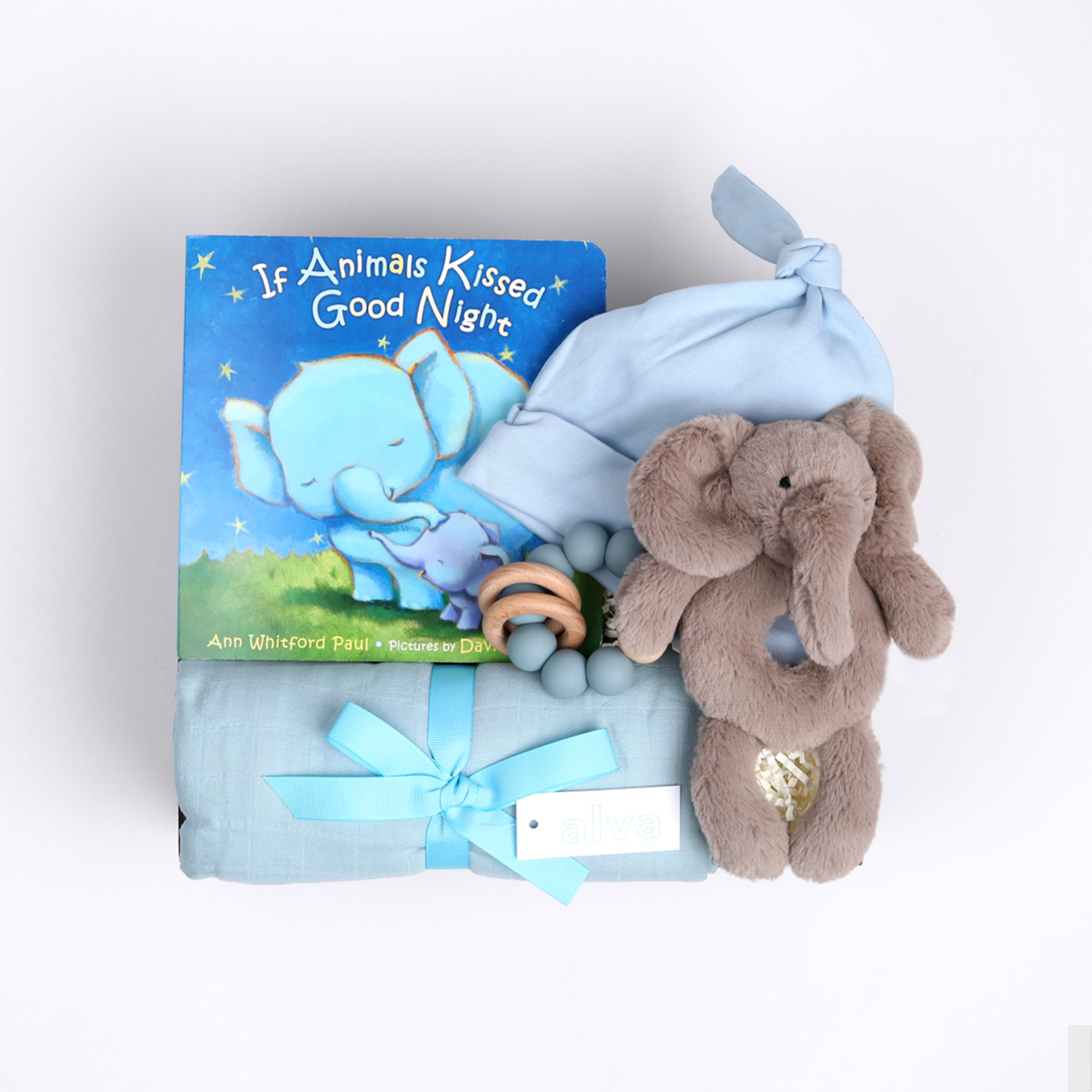 BOXFOX New Baby Boy Box in creme, including a swaddle, elephant rattle, teether, hat and book.