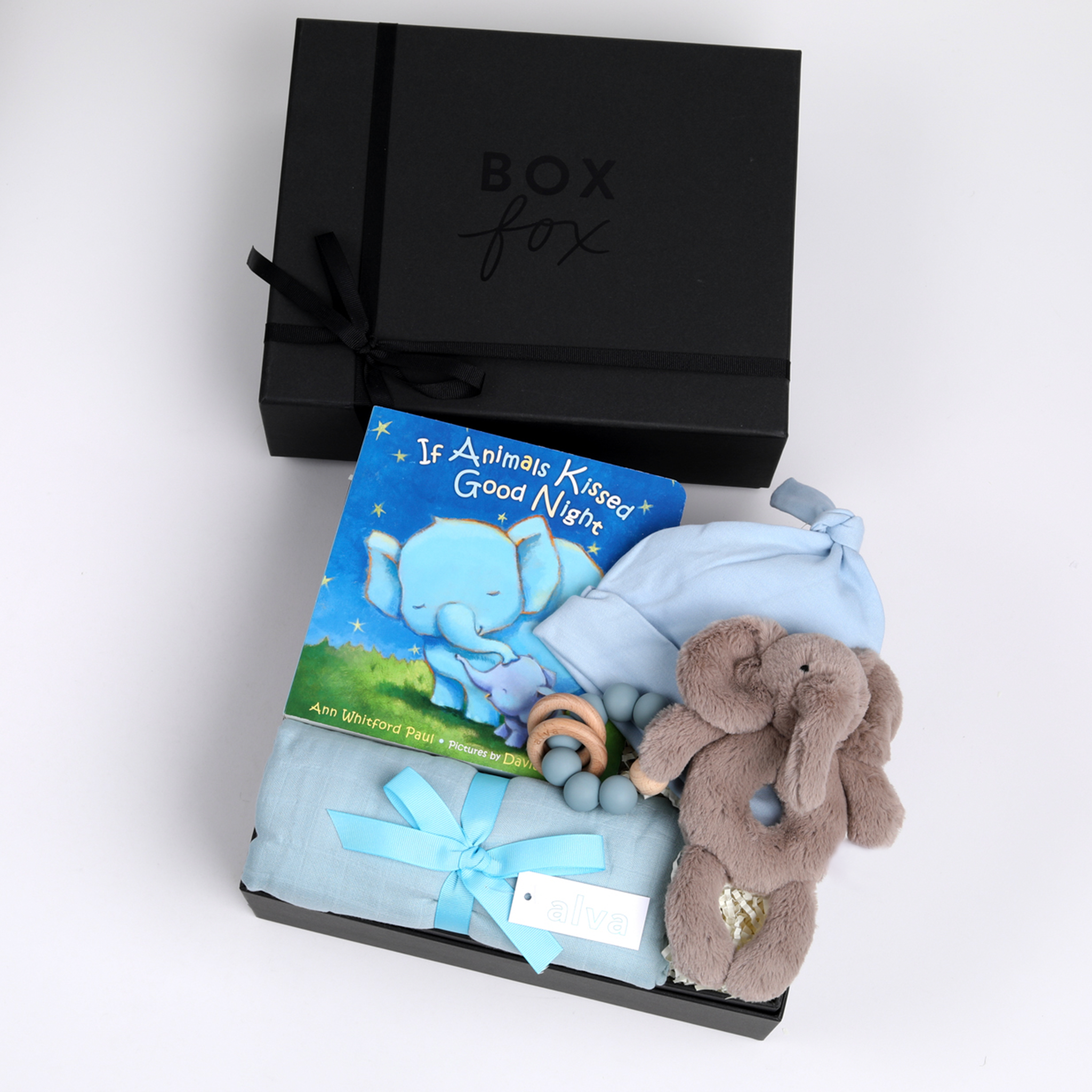 BOXFOX New Baby Boy Box in black, including a swaddle, elephant rattle, teether, hat and book.