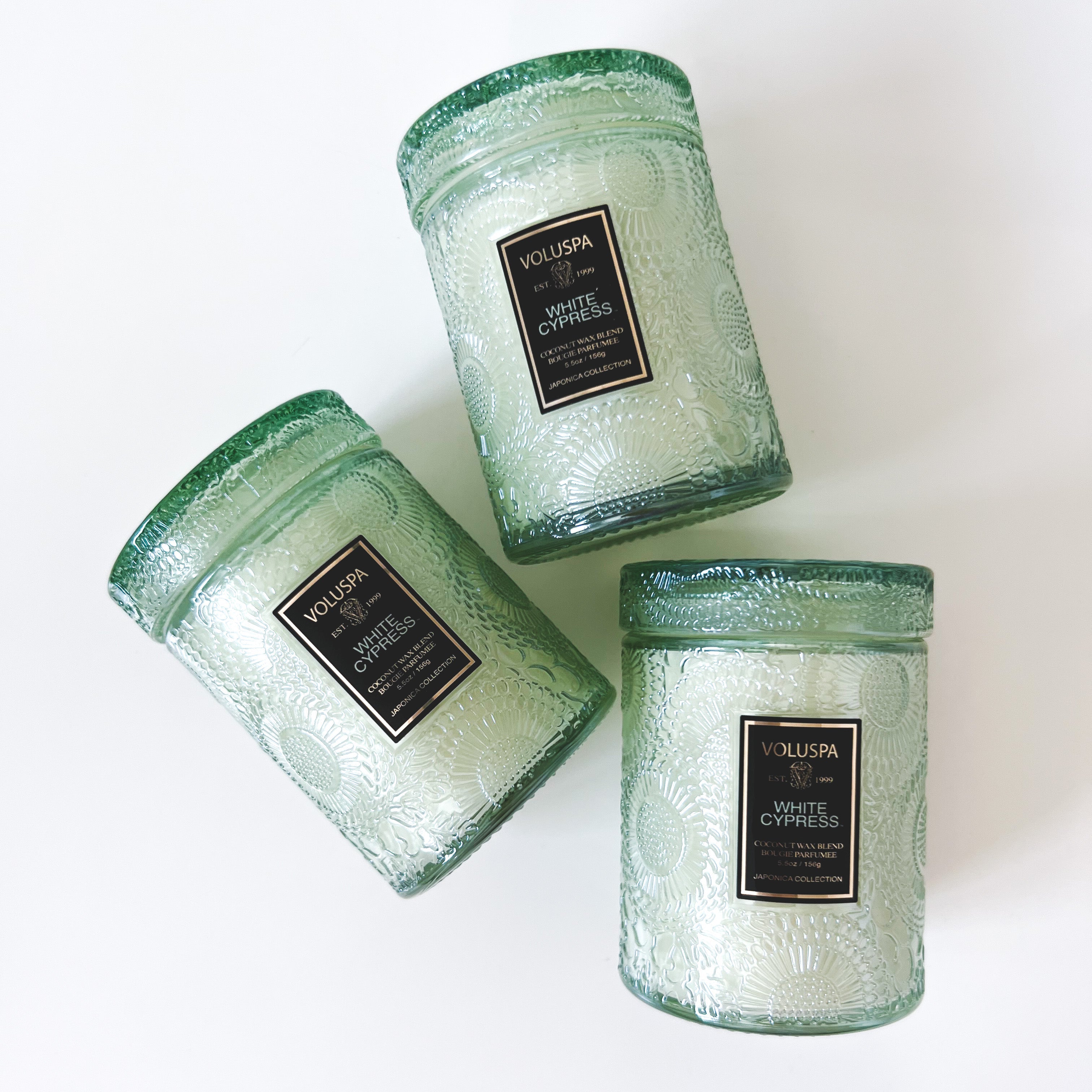 three white cypress medium glass jar candles from voluspa