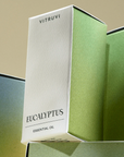 White and green box with "VITRUVI EUCALYPTUS ESSENTIAL OIL" written on the front.