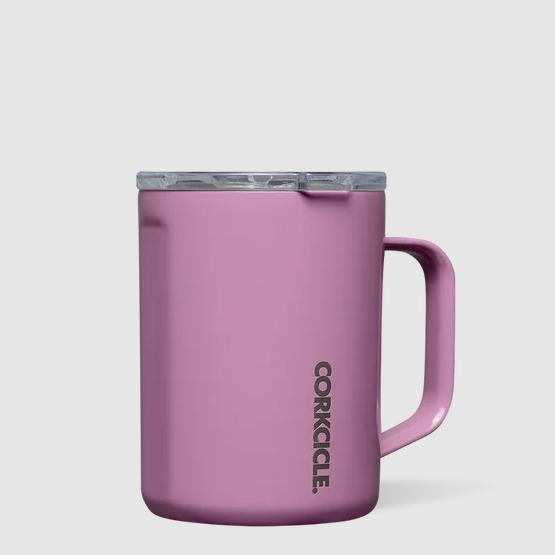 Pink purple insulated mug with clear plastic lid. Text on side of mug reads "CORKCICLE." in silver metallic. Photographed on white background. 