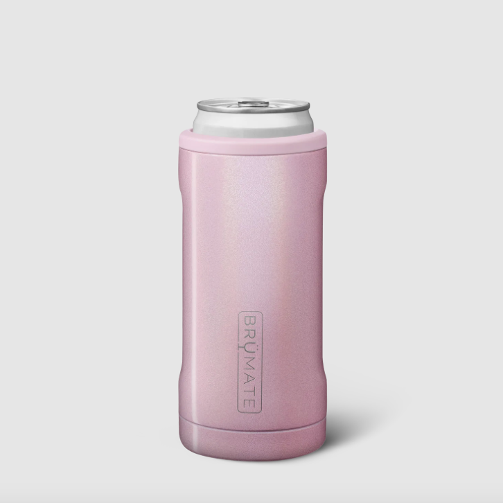 A pink double insulated can holder with pink glitter all over holding a silver can inside photographed on white background.