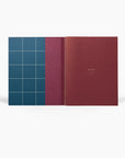 UMA Large Softcover Notebook | Dark Blue inside cover.