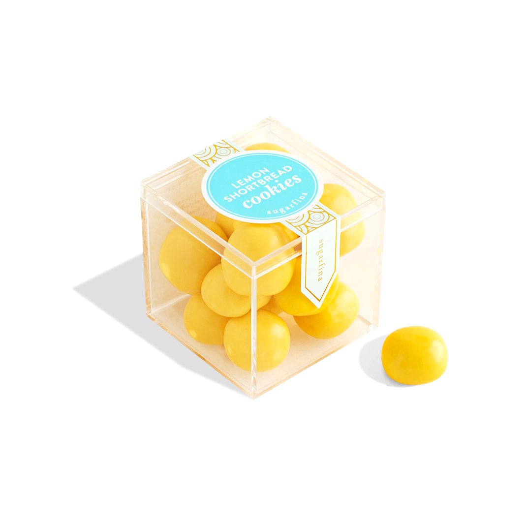 Plastic clear cube with yellow small balls flavored after lemon shortbread cookies
